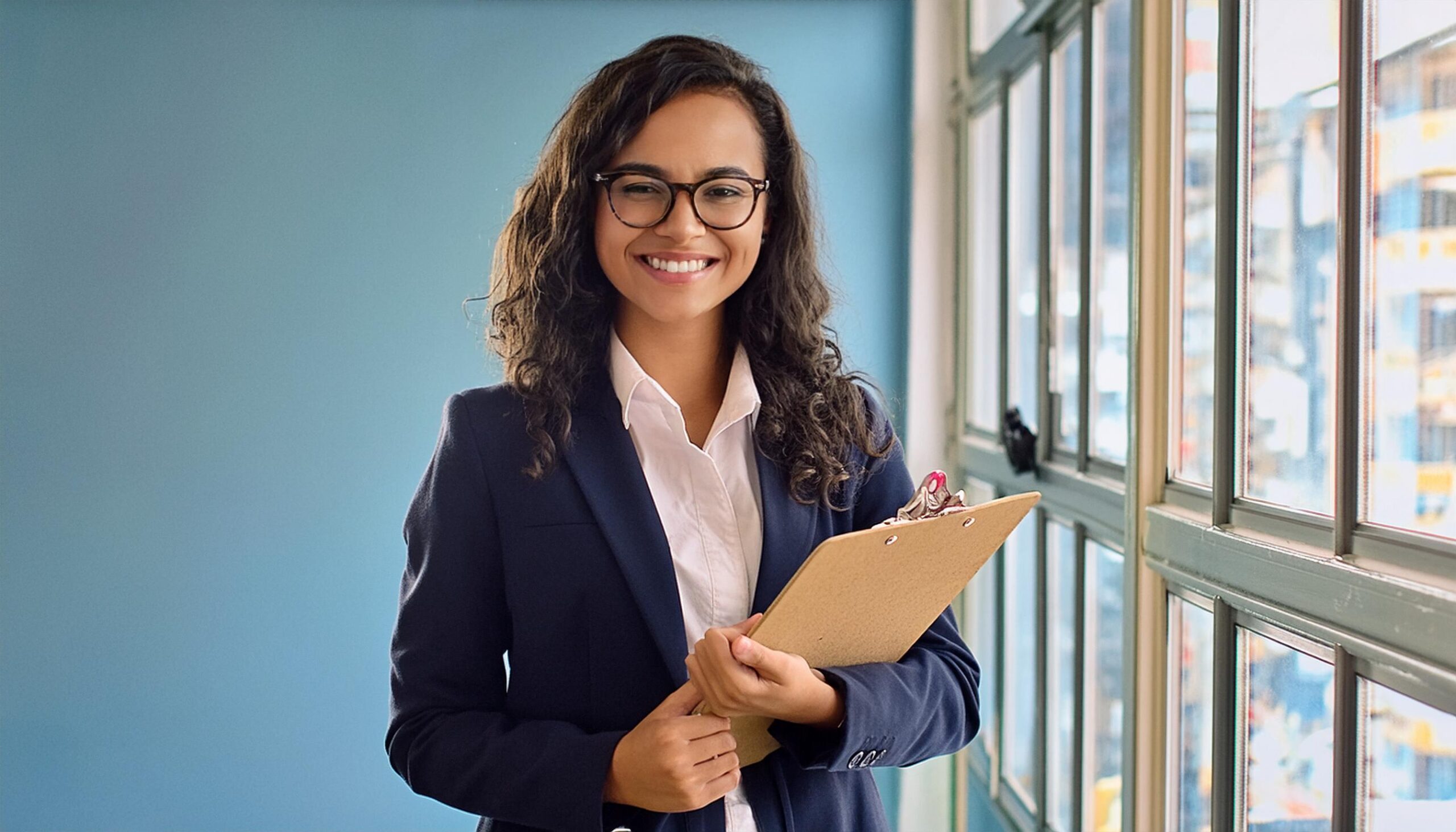 Woman holding a clipboard